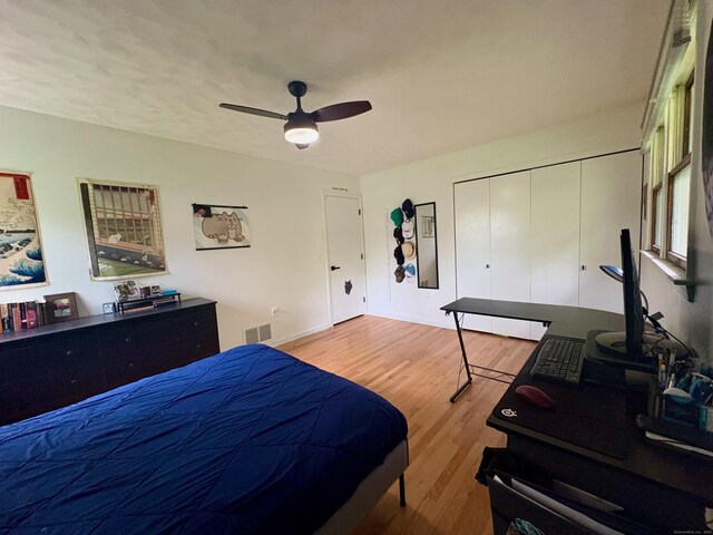 64 Sherwood Ln, Norwich, CT 06360 - bedroom featuring a closet, wood finished floors, visible vents, ceiling fan, and baseboards
