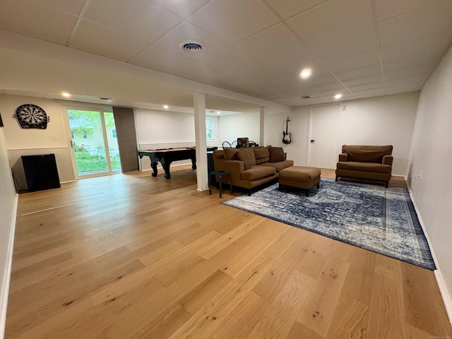 64 Sherwood Ln, Norwich, CT 06360 - living area with a drop ceiling, baseboards, visible vents, light wood-type flooring, and billiards