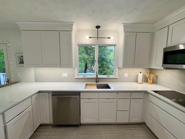 64 Sherwood Ln, Norwich, CT 06360 - kitchen with a sink, tasteful backsplash, appliances with stainless steel finishes, and a chandelier