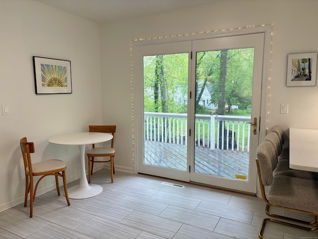 64 Sherwood Ln, Norwich, CT 06360 - doorway featuring visible vents and baseboards