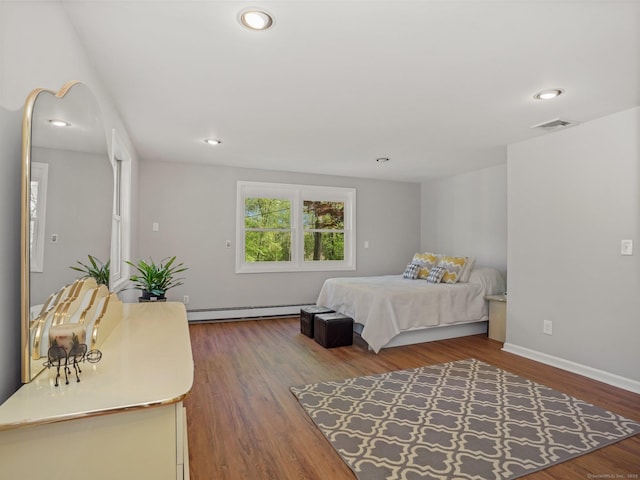 44 Buckingham Ridge Rd, Wilton, CT 06897 - bedroom with a baseboard radiator, wood finished floors, recessed lighting, and baseboards