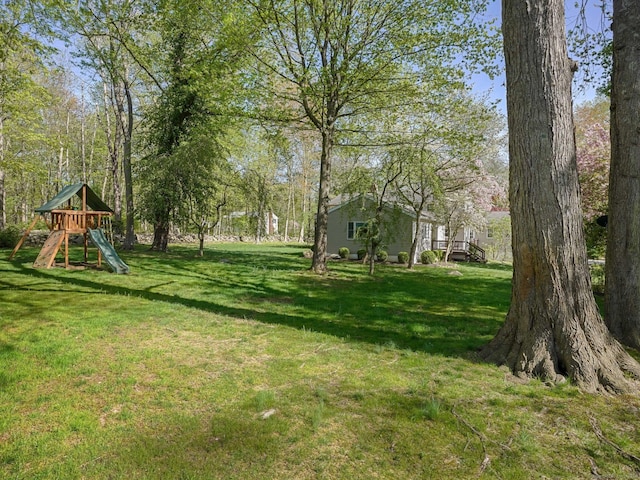 44 Buckingham Ridge Rd, Wilton, CT 06897 - view of green lawn with a playground