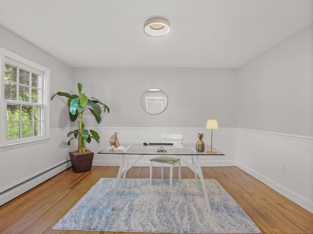 44 Buckingham Ridge Rd, Wilton, CT 06897 - office space with a baseboard radiator, wood finished floors, and baseboards