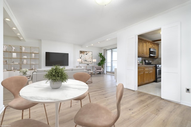 65 Glenbrook Rd Apt 6B, Stamford, CT 06902 - dining room featuring beamed ceiling, light wood-style flooring, and recessed lighting