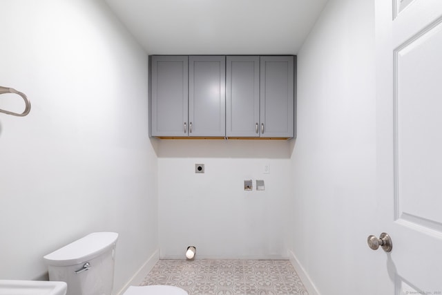 laundry room featuring baseboards, cabinet space, hookup for an electric dryer, and hookup for a washing machine