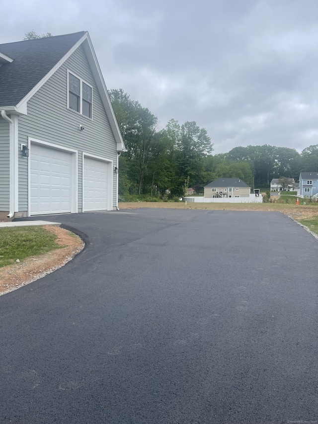 896 E St, Middletown, CT 06457 - garage with asphalt driveway