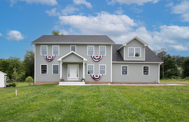 896 E St, Middletown, CT 06457 - colonial house with a front lawn and roof with shingles
