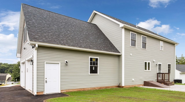 896 E St, Middletown, CT 06457 - rear view of property with a yard and a shingled roof
