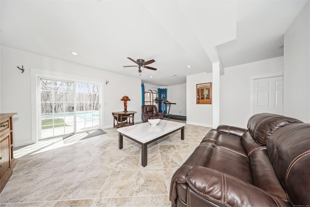 living area with recessed lighting, baseboards, and ceiling fan