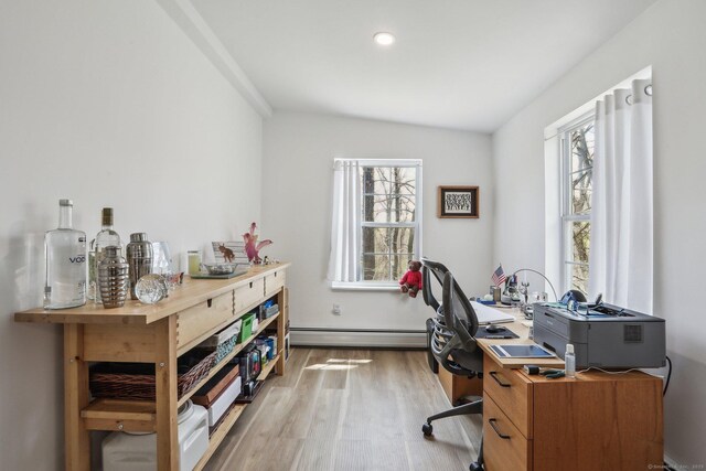 office space featuring recessed lighting, wood finished floors, and baseboard heating