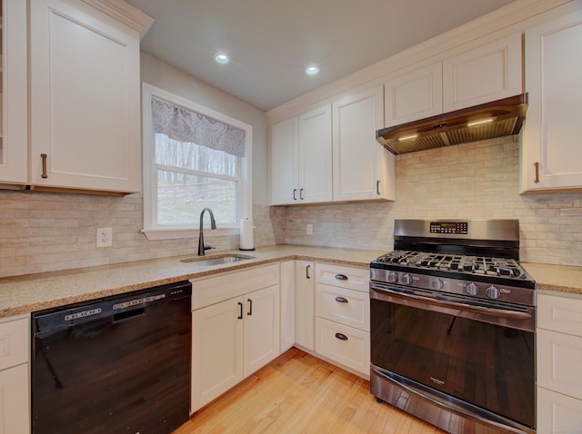 10 Versailles Rd, Lisbon, CT 06351 - kitchen featuring a sink, light wood-style flooring, custom range hood, stainless steel range with gas stovetop, and black dishwasher