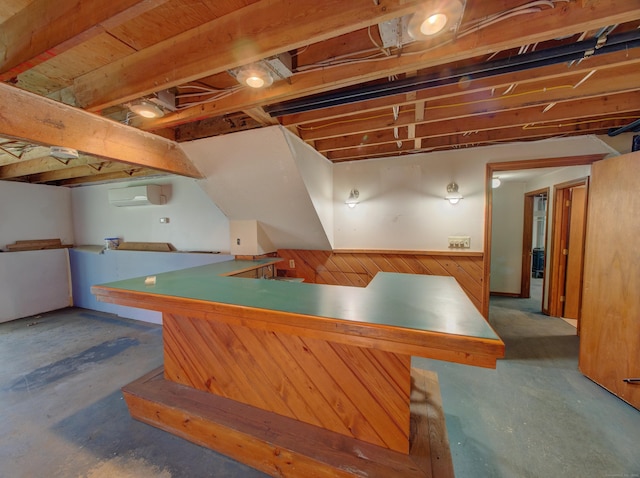 10 Versailles Rd, Lisbon, CT 06351 - recreation room with a wall mounted AC, bar area, and concrete floors