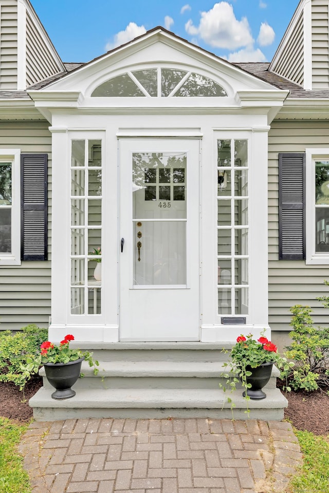 435 Lenox Rd, Fairfield, CT 06825 - view of exterior entry with a shingled roof