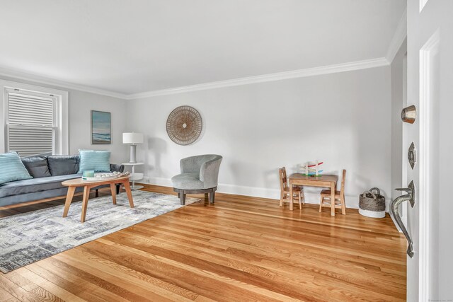 435 Lenox Rd, Fairfield, CT 06825 - living area with ornamental molding, light wood-style flooring, and baseboards