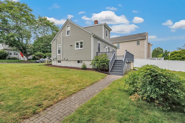 435 Lenox Rd, Fairfield, CT 06825 - view of side of home with a chimney, a wooden deck, and stairway