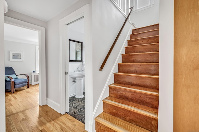 435 Lenox Rd, Fairfield, CT 06825 - stairs featuring radiator, wood finished floors, and baseboards