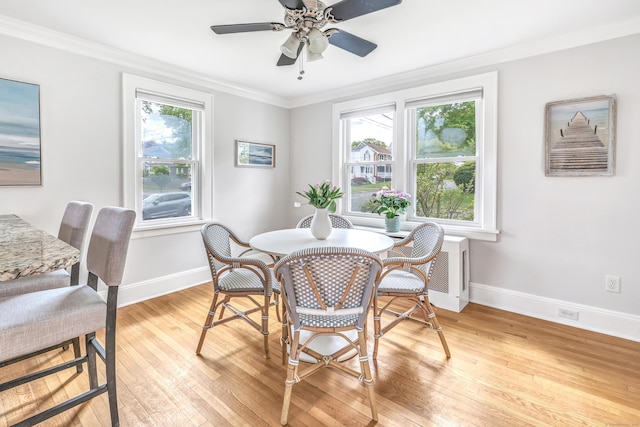 435 Lenox Rd, Fairfield, CT 06825 - dining area featuring baseboards, light wood-style flooring, crown molding, and a ceiling fan