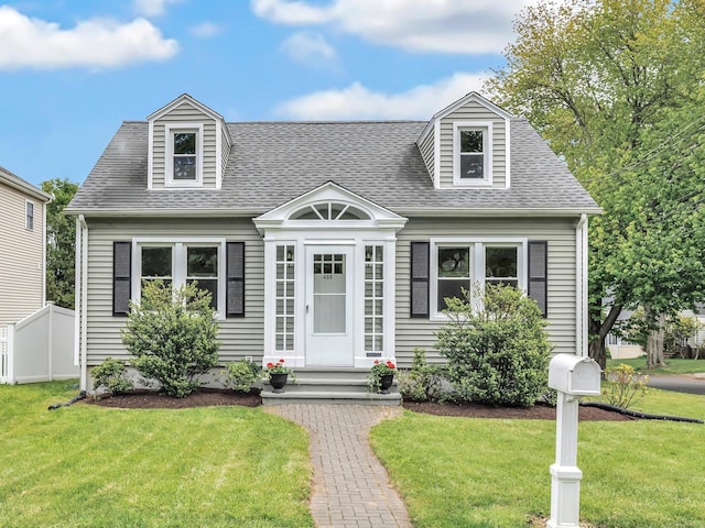 435 Lenox Rd, Fairfield, CT 06825 - cape cod home with a front lawn and roof with shingles