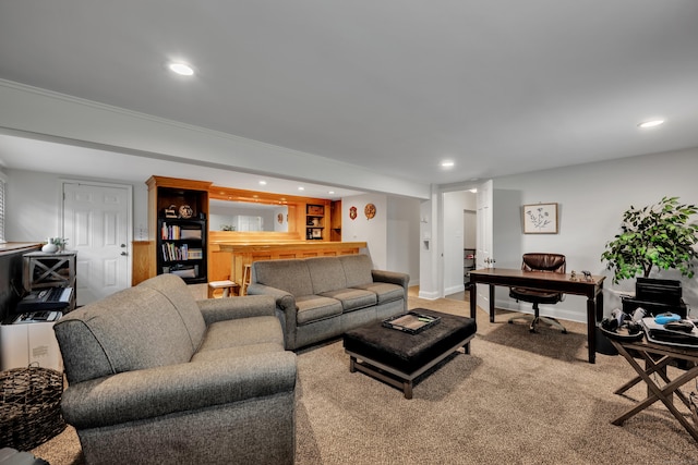 living area featuring baseboards, a dry bar, light carpet, and recessed lighting