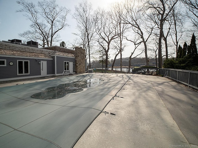 view of pool featuring a fenced in pool, a patio, and fence