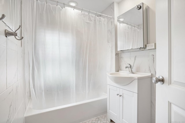 full bath featuring decorative backsplash, vanity, and shower / bath combination with curtain