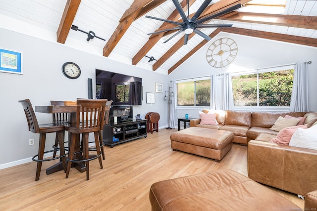 206 New Rd, Avon, CT 06001 - living area with beamed ceiling, light wood-style floors, and baseboards