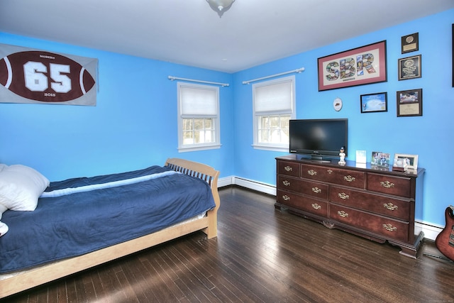 33 Pequot Trl, Westport, CT 06880 - bedroom with a baseboard heating unit, wood finished floors, and baseboards