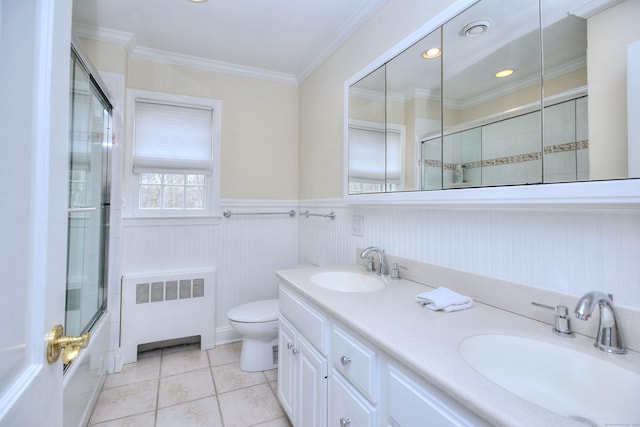 33 Pequot Trl, Westport, CT 06880 - full bath featuring radiator, toilet, double vanity, tile patterned flooring, and ornamental molding