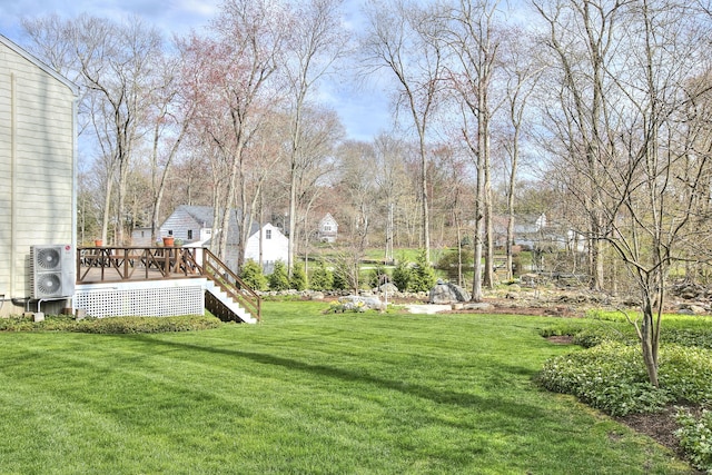 33 Pequot Trl, Westport, CT 06880 - view of green lawn featuring a wooden deck, stairway, and ac unit