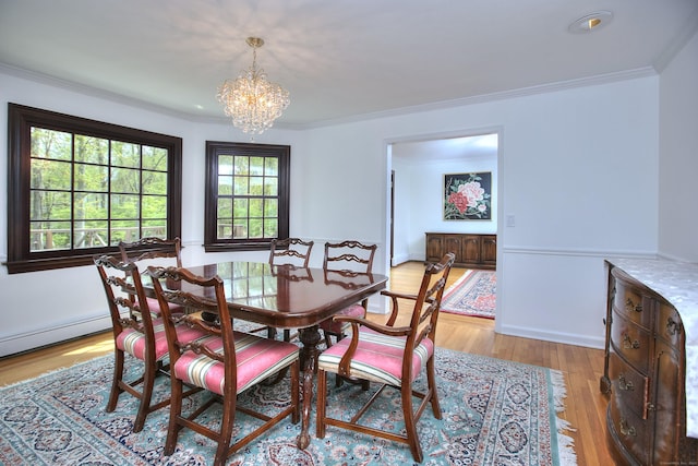 33 Pequot Trl, Westport, CT 06880 - dining room featuring a chandelier, crown molding, and light wood-type flooring