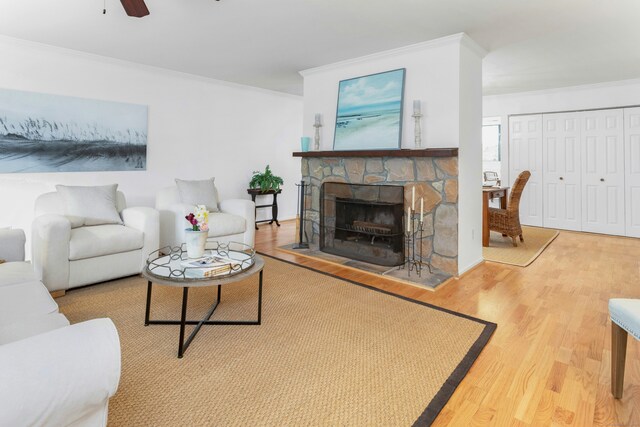 201 Rowayton Woods Dr Unit 201, Norwalk, CT 06854 - living area featuring a fireplace, wood finished floors, and crown molding