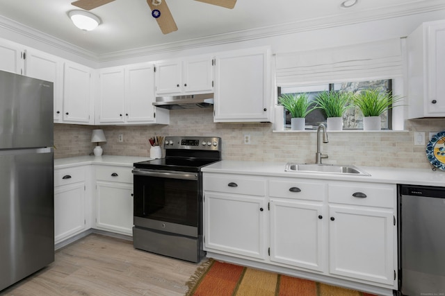 201 Rowayton Woods Dr Unit 201, Norwalk, CT 06854 - kitchen with light countertops, appliances with stainless steel finishes, under cabinet range hood, and a sink
