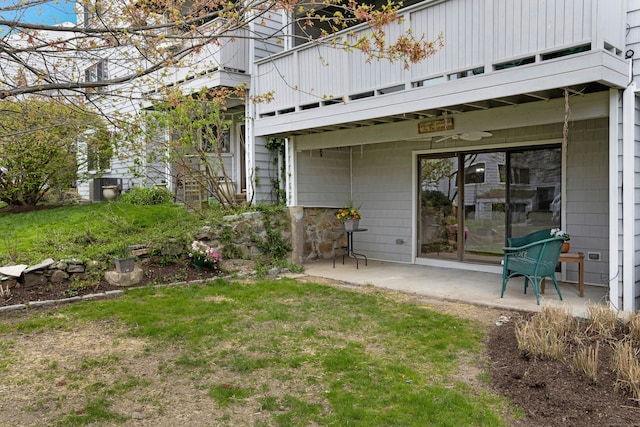 201 Rowayton Woods Dr Unit 201, Norwalk, CT 06854 - back of property with a lawn, a balcony, and a patio