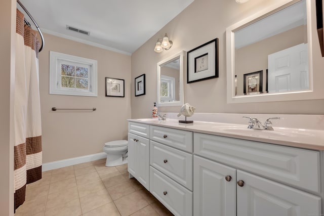 bathroom with a sink, double vanity, toilet, tile patterned floors, and visible vents