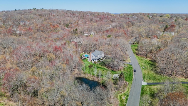 aerial view with a wooded view
