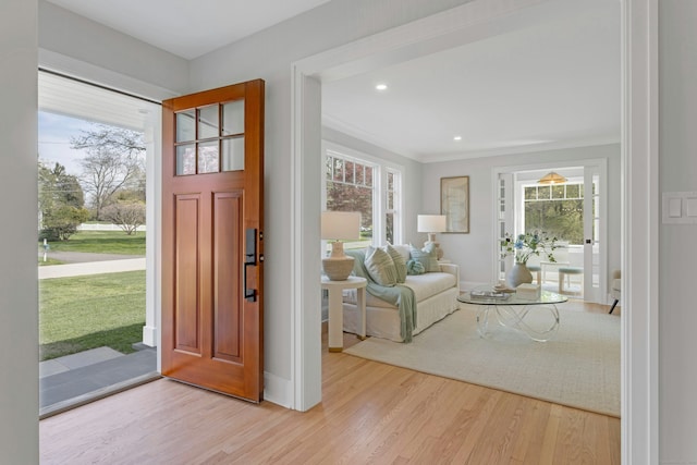4 Rabbit Ln, Darien, CT 06820 - foyer featuring wood finished floors, a wealth of natural light, and crown molding