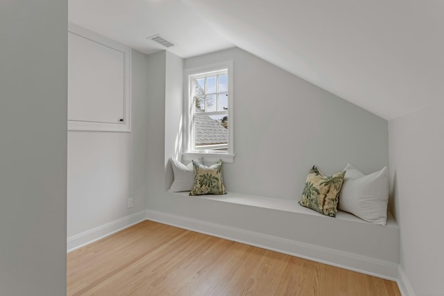 4 Rabbit Ln, Darien, CT 06820 - unfurnished room featuring lofted ceiling, baseboards, visible vents, and light wood-style floors