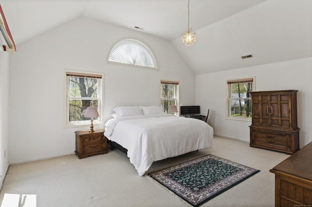 carpeted bedroom featuring baseboards, visible vents, an inviting chandelier, and vaulted ceiling