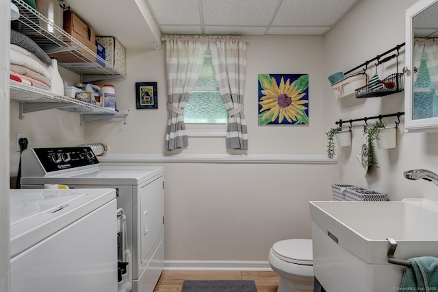 531 Oxbow Dr, Torrington, CT 06790 - washroom with separate washer and dryer and baseboards