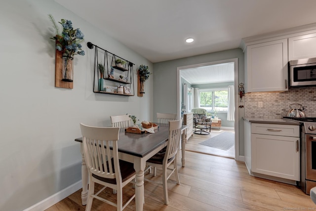 531 Oxbow Dr, Torrington, CT 06790 - dining space with light wood-type flooring, baseboards, and recessed lighting