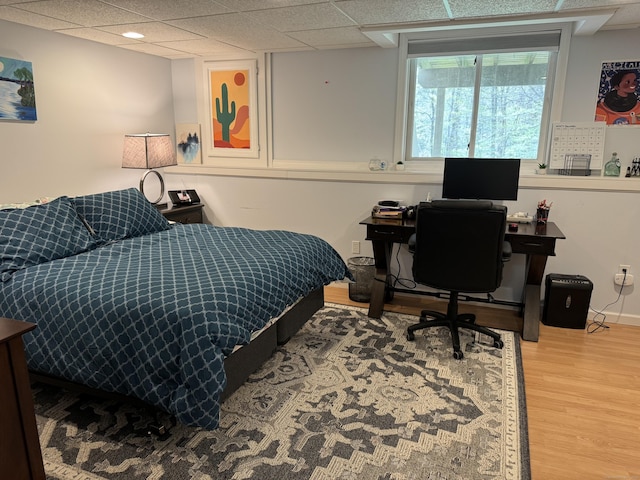 bedroom with wood finished floors