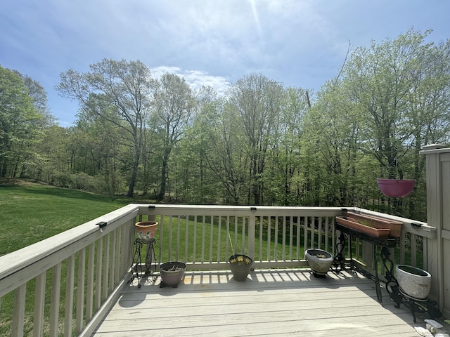 deck featuring a lawn