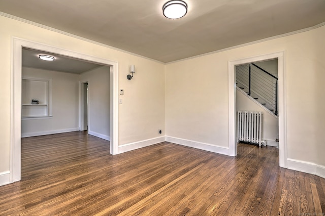 53 Bina Ave, Windsor, CT 06095 - empty room featuring radiator, dark wood-style flooring, baseboards, and ornamental molding
