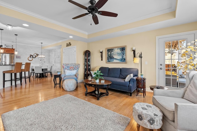95 S Ridge Ln Unit G103, Berlin, CT 06037 - living room with a tray ceiling, light wood finished floors, and ceiling fan with notable chandelier