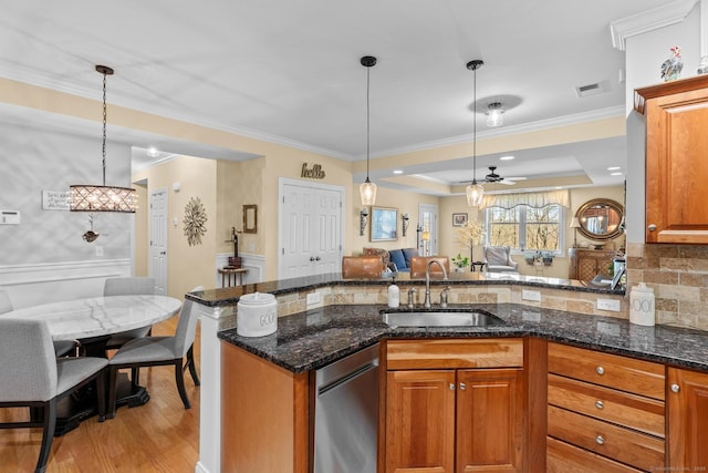 95 S Ridge Ln Unit G103, Berlin, CT 06037 - kitchen with brown cabinetry, light wood finished floors, open floor plan, and a sink