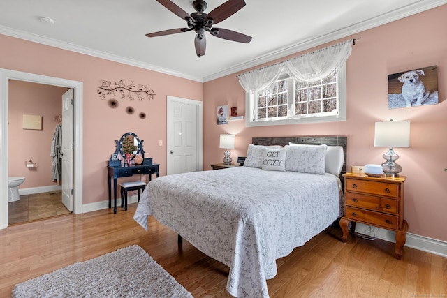 95 S Ridge Ln Unit G103, Berlin, CT 06037 - bedroom with baseboards, ensuite bath, wood finished floors, and crown molding