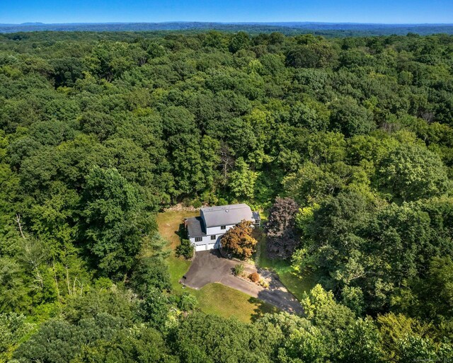 8 Oak Ln, Weston, CT 06883 - drone / aerial view with a wooded view