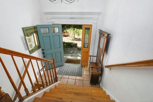 8 Oak Ln, Weston, CT 06883 - entryway with stairway, baseboards, a notable chandelier, and light wood finished floors