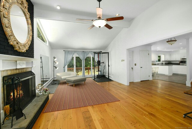 8 Oak Ln, Weston, CT 06883 - workout room with high vaulted ceiling, ceiling fan, and wood-type flooring