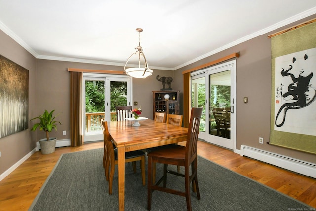 8 Oak Ln, Weston, CT 06883 - dining room featuring a baseboard heating unit, baseboards, crown molding, and wood finished floors